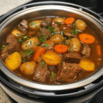 A steaming bowl of beef stew made in a pressure cooker, filled with tender beef chunks, carrots, potatoes, and celery, all bathed in a rich, savory broth.