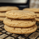 Maple Brown Sugar Cookies with a soft, chewy texture, drizzled with maple glaze, and garnished with a sprinkle of brown sugar for a cozy autumn treat.