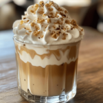 Creamy Coffee Delight dessert in a glass, featuring layers of rich coffee-infused cream, topped with whipped cream and a sprinkle of cocoa powder or coffee beans.